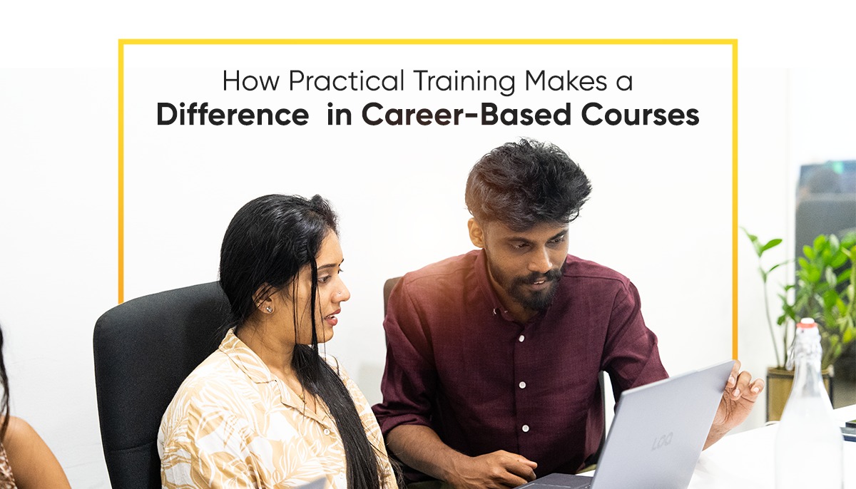 A student and trainer working together on a laptop during practical training, highlighting how hands-on learning improves career-based courses.