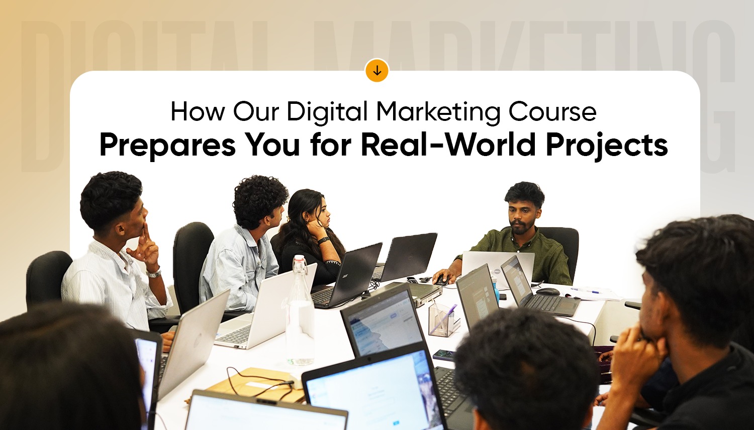 Students working on laptops during a hands-on session of a digital marketing course, guided by an instructor to prepare them for real-world projects.