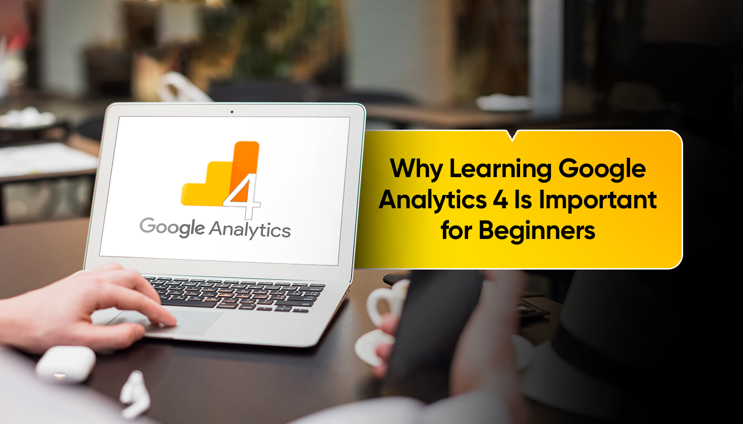 Laptop showing Google Analytics 4 dashboard illustrating website traffic analysis and digital marketing insights for beginners learning GA4 tools and reporting
